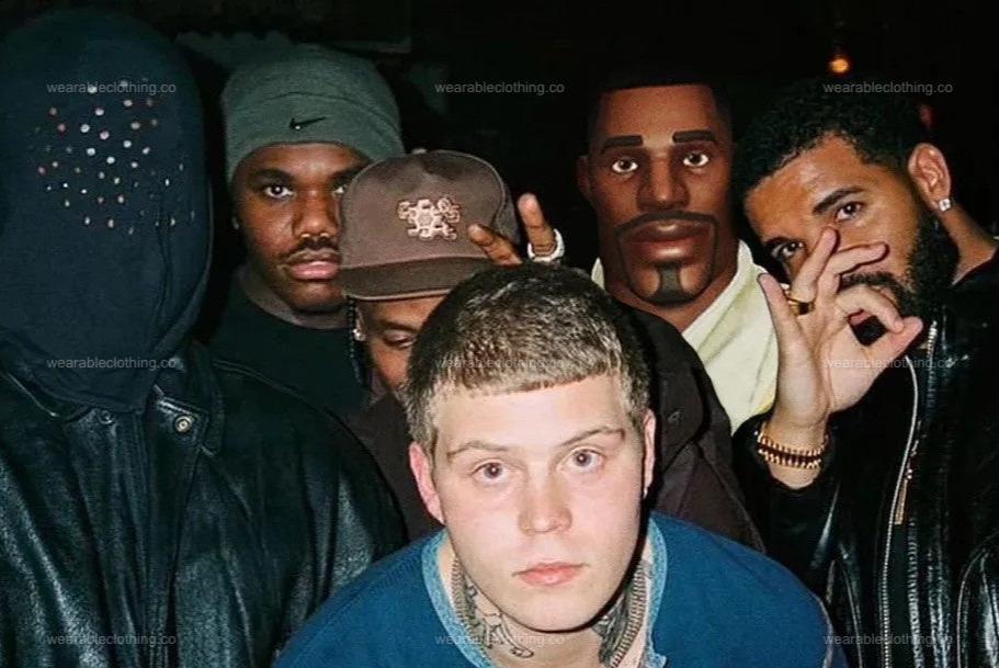 Black T-shirt with Fortnite’s default character alongside rappers like Drake and Kanye West