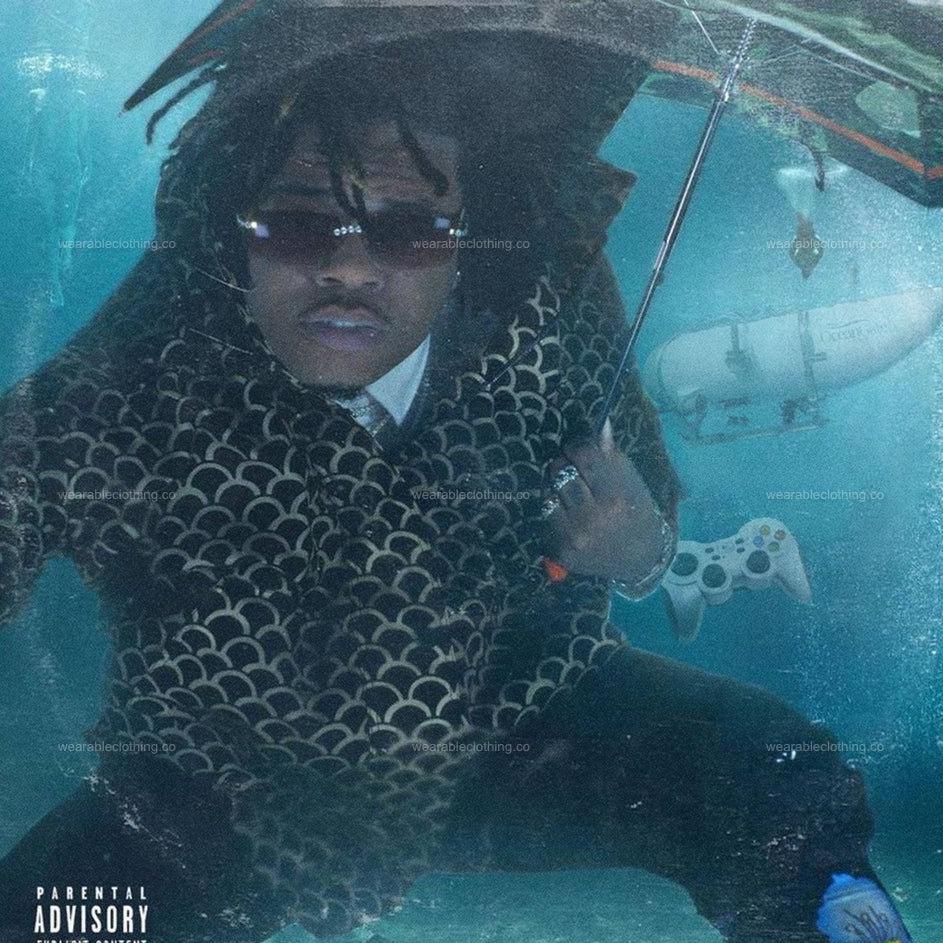 Black T-shirt with rapper Gunna holding an umbrella underwater beside the OceanGate submarine that drowned