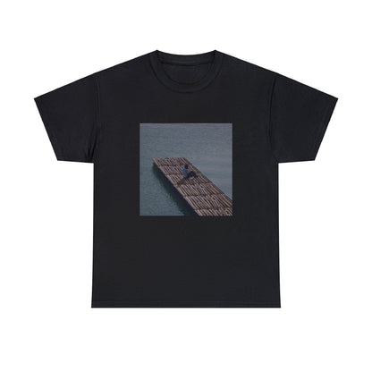 Black T-shirt with the cover of Baby Keem’s The Melodic Blue studio album, but the floor is made of Fortnite wood build