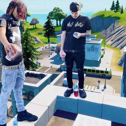 Black T-shirt with Yeat and rapper SEPTEMBERSRICH on top of a Tilted Towers building
